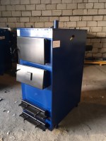 На фото твердотопливный котел Идмар GK1 75 КВТ